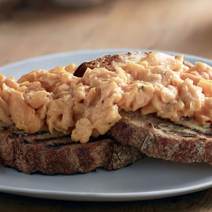 Luxurious scrambled eggs with Mustard with Chablis white wine and Morel mushrooms