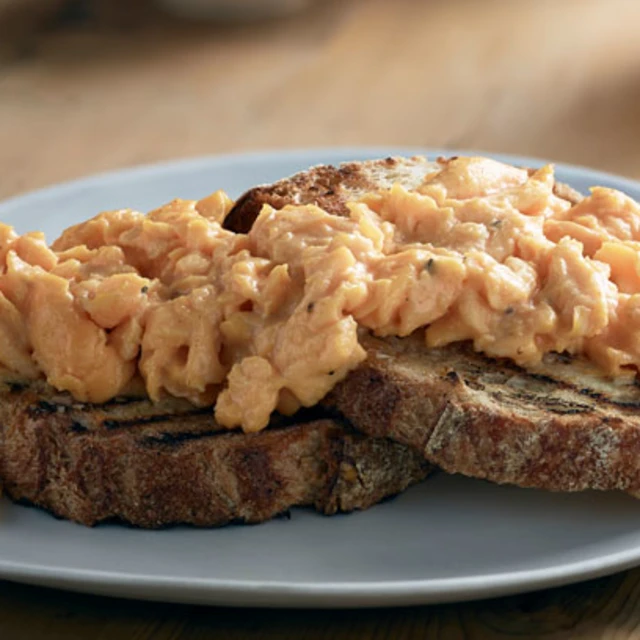 Luxurious scrambled eggs with Mustard with Chablis white wine and Morel mushrooms