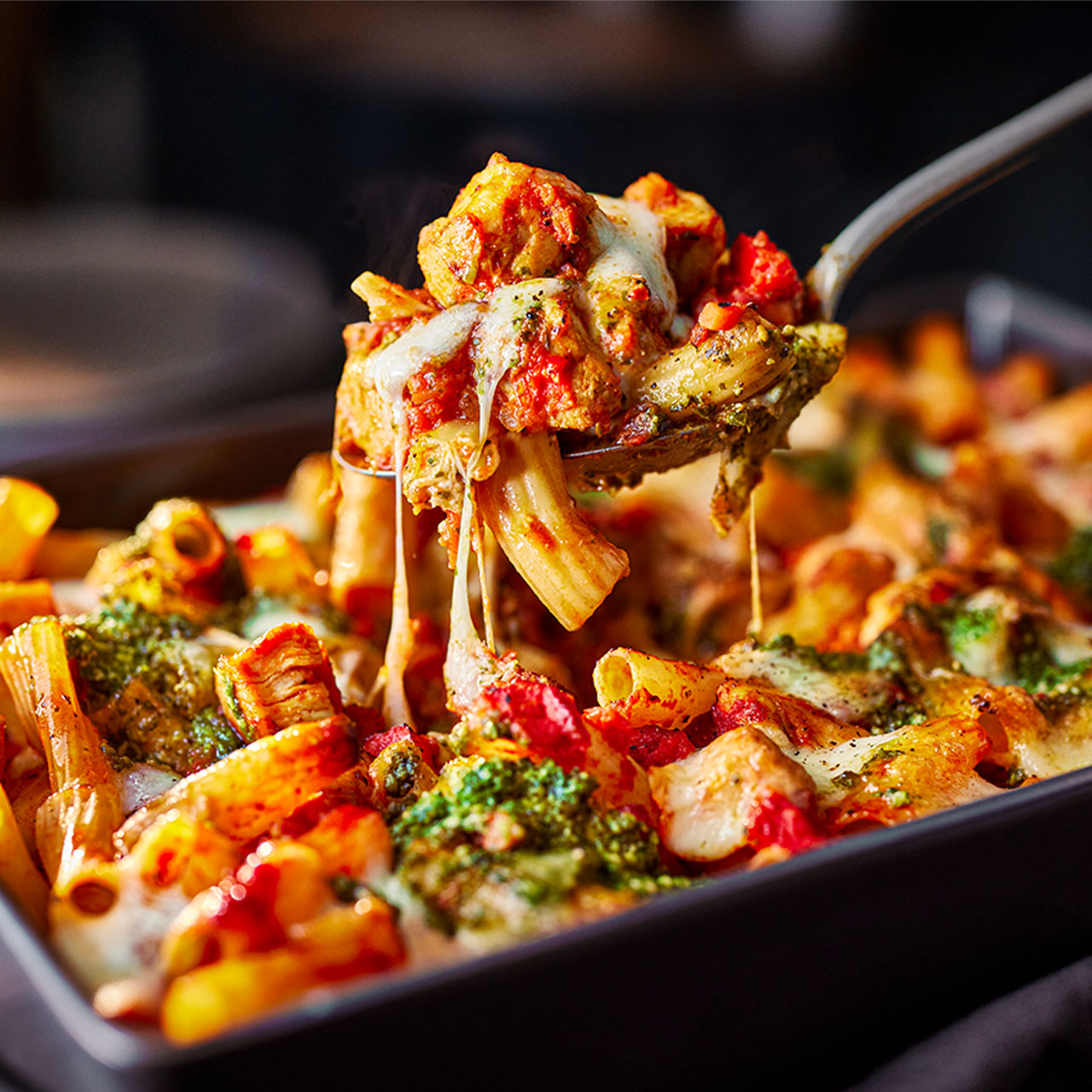 Cheesy Chicken and Pesto Pasta Bake