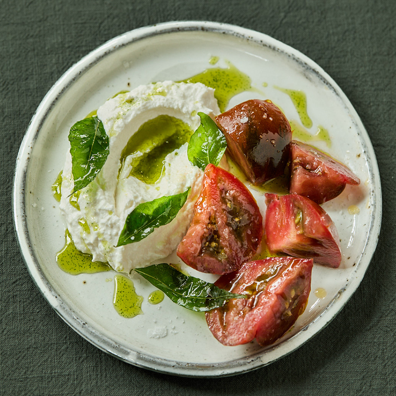 Iberiko Tomatoes, Whipped Burrata, Curry Leaf and Fennel Seed Oil