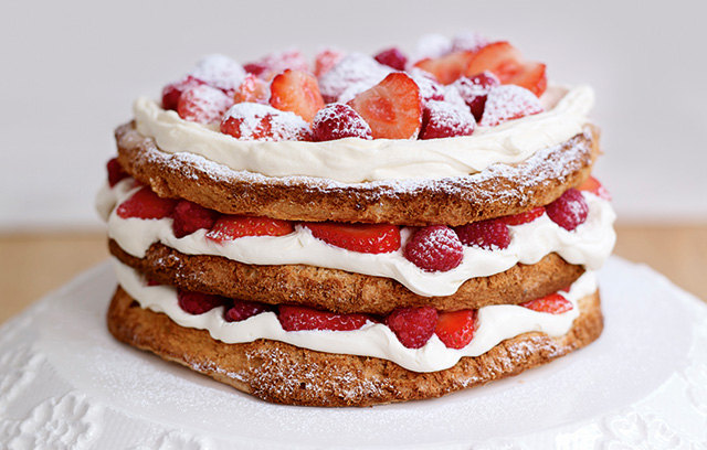 Hazelnut Meringue Layer Cake with Strawberries & Raspberries