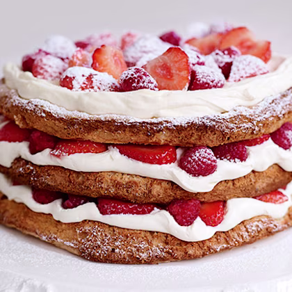 Hazelnut Meringue Layer Cake with Strawberries & Raspberries