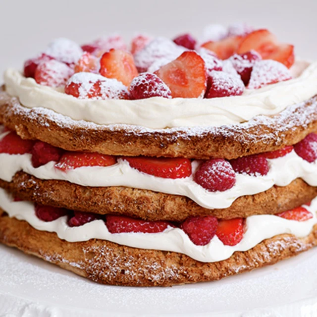 Hazelnut Meringue Layer Cake with Strawberries & Raspberries