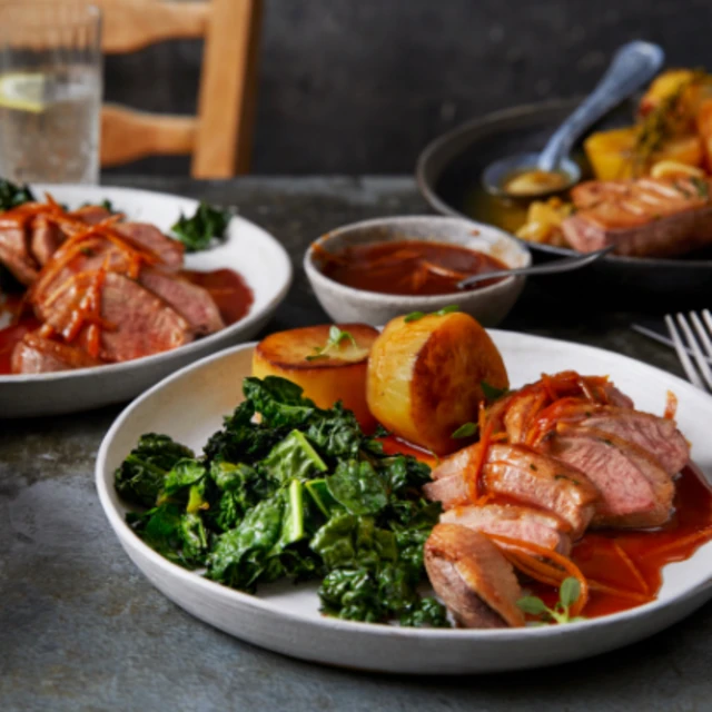 Duck à L'Orange with Fondant Potato and Chiffonade of Cavolo Nero