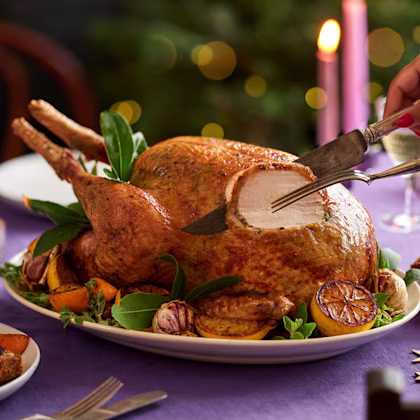 Soft Herb and Sumac Butter Turkey with Cranberry and Pistachio Stuffing