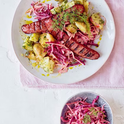 Smoked sausages with smashed dill potatoes and pickled beetroot and red onion slaw