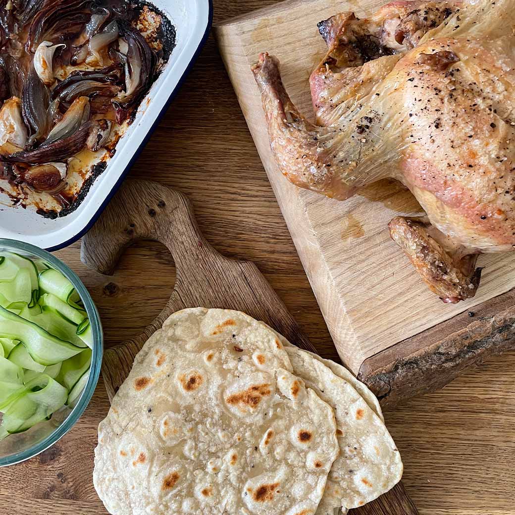 Chicken, roasted red onion and pickled cucumber flatbread