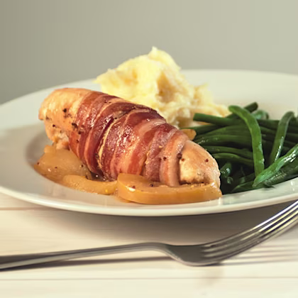 Chicken with apple in bacon
