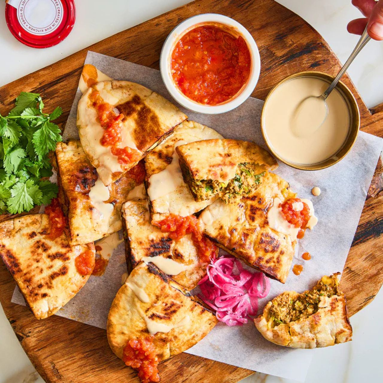 We can't get enough of Yotam Ottolenghi's on-trend arayes - they're crispy Middle Eastern stuffed pittas, packed with a kofta-style lamb filling.