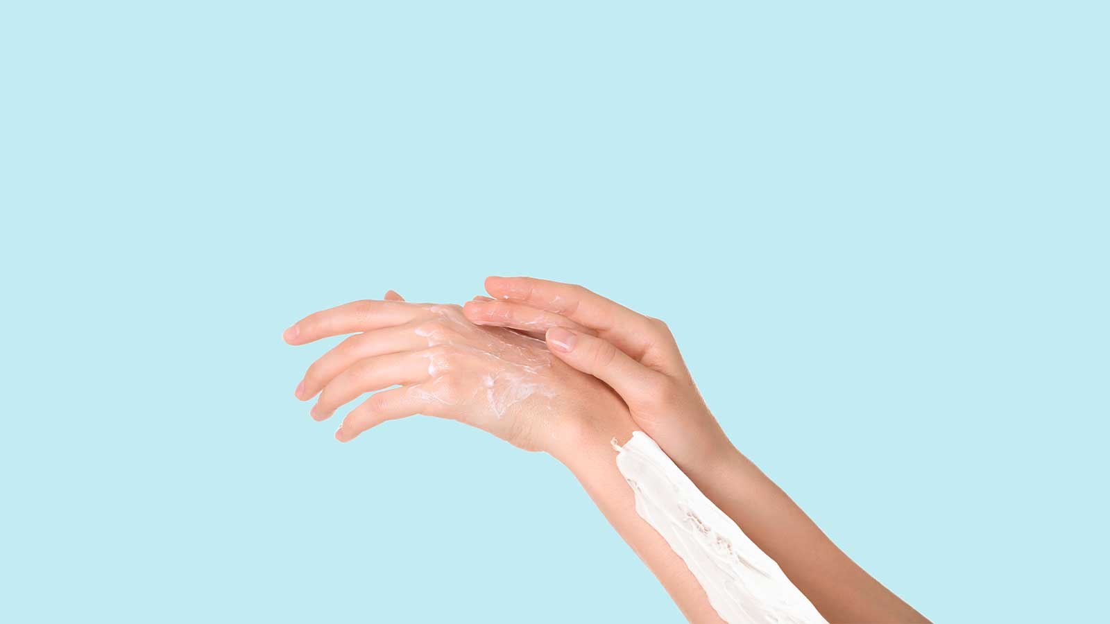 Applying shaving gel on the hand