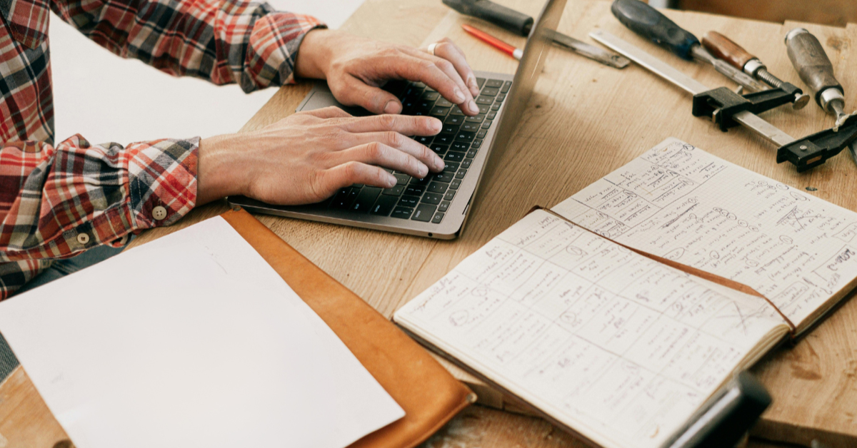 A person typing on a computer.