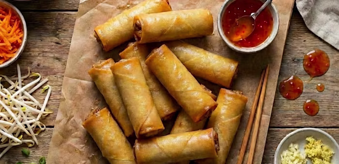 air fried spring rolls surrounded by ingredients