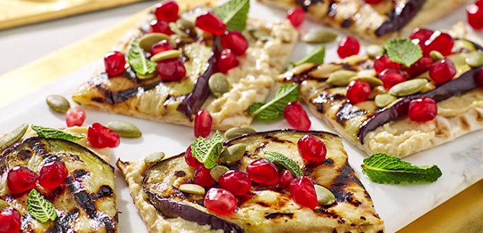 flatbreads with pomegranate and houmous