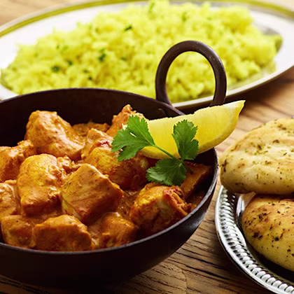 Chicken Makhani with Basmati Rice and Garlic and Coriander Naan