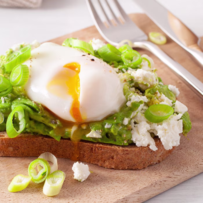 Poached Eggs with Avocado and Feta on Toast