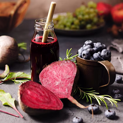 beetroot and berry wellness shot in glass bottle