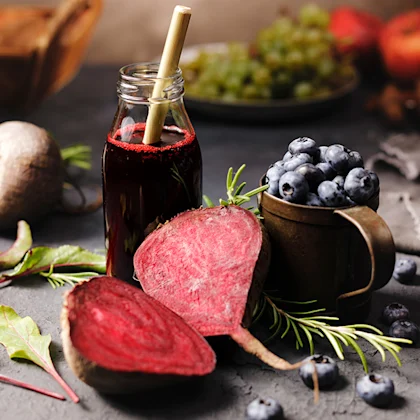 beetroot and berry wellness shot in glass bottle