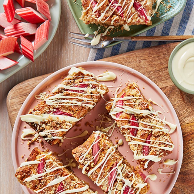 rhubarb crumble bites drizzled with white chocolate