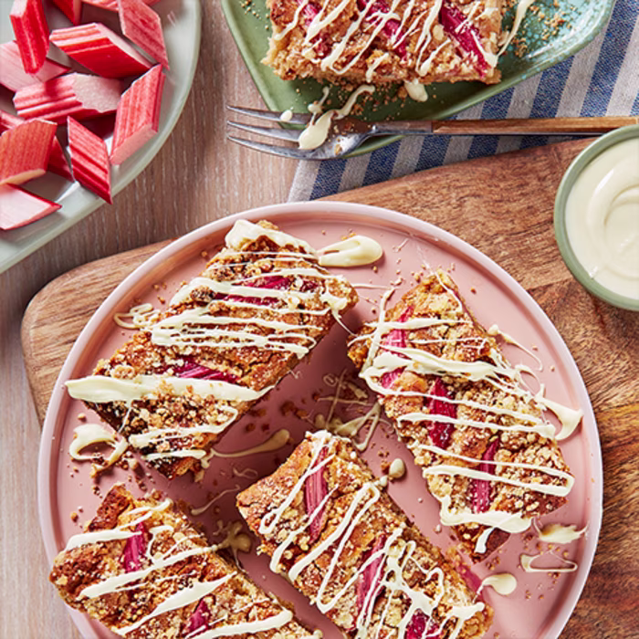 rhubarb crumble bites drizzled with white chocolate