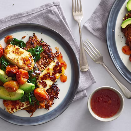 Sweet potato rosti stack with roasted tomatoes, halloumi, avocado and sweet chilli sauce