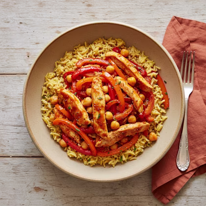chicken, peppers and chickpeas on a bed of rice