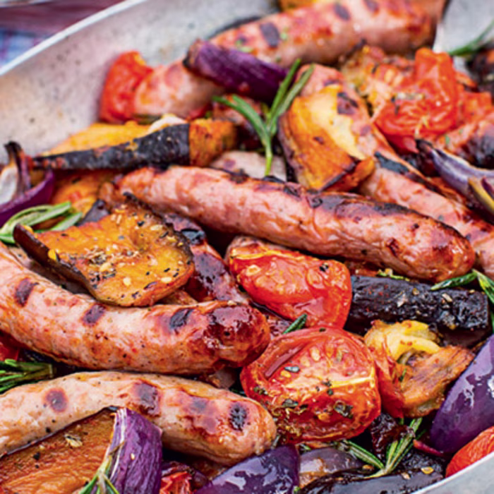 Maple-glazed Sausages with Smoked Aubergines and Tomatoes