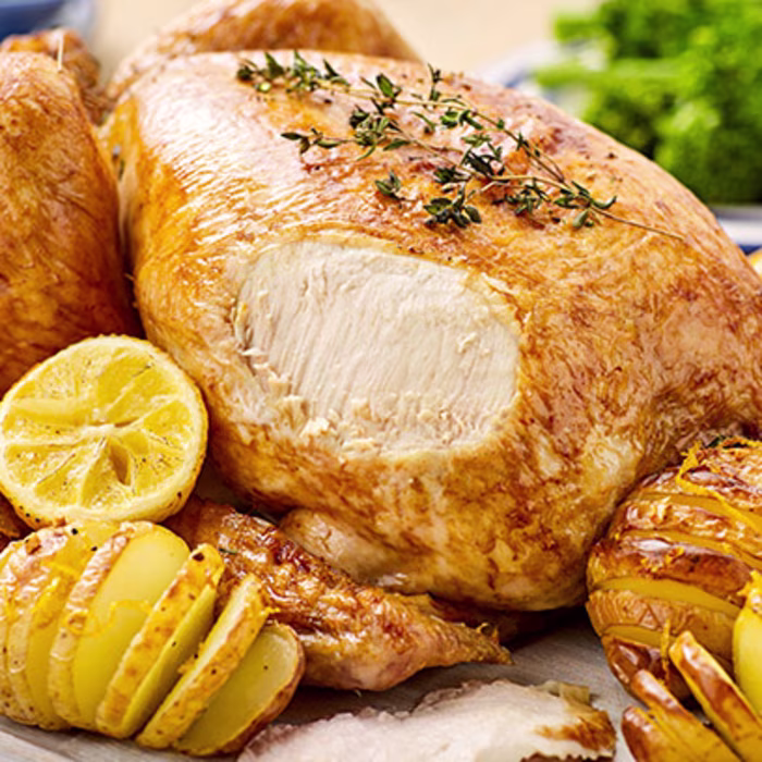 Roast Chicken with Lemon and Garlic served with Hasselback Potatoes