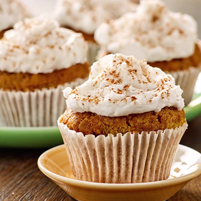 Carrot Cake Muffins with Coconut Frosting
