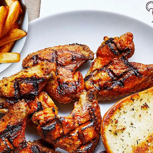 Nando’s PERi-PERi Chicken Wings, PERi-Chips and Garlic Bread
