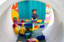 Kid playing in New York Hall of Science