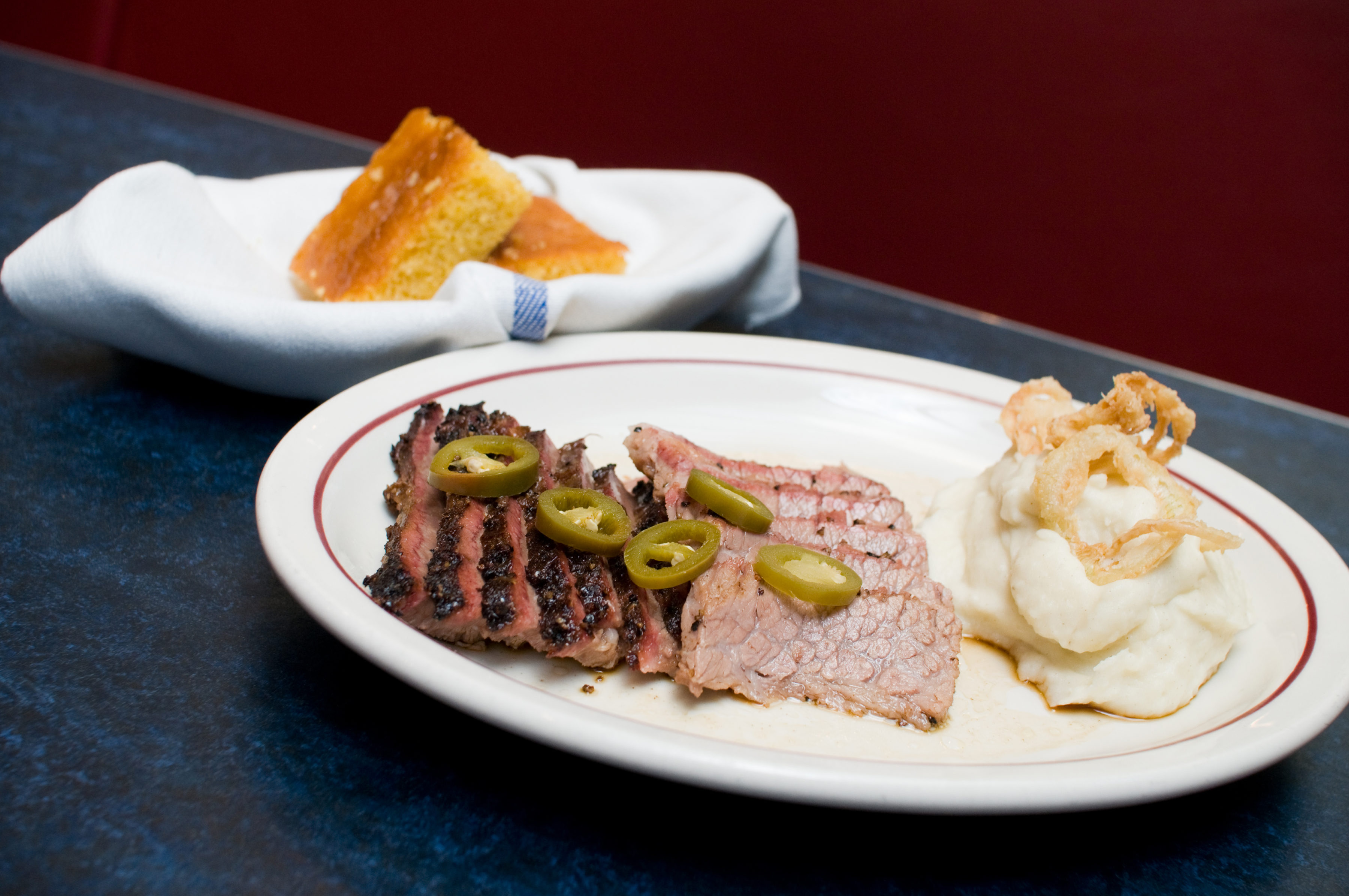 blue-smoke---sliced-texas-style-beef-brisket-w--mashed-and-onions-and-corn-bread-3