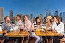 People eating outdoors at North River Lobster Company
