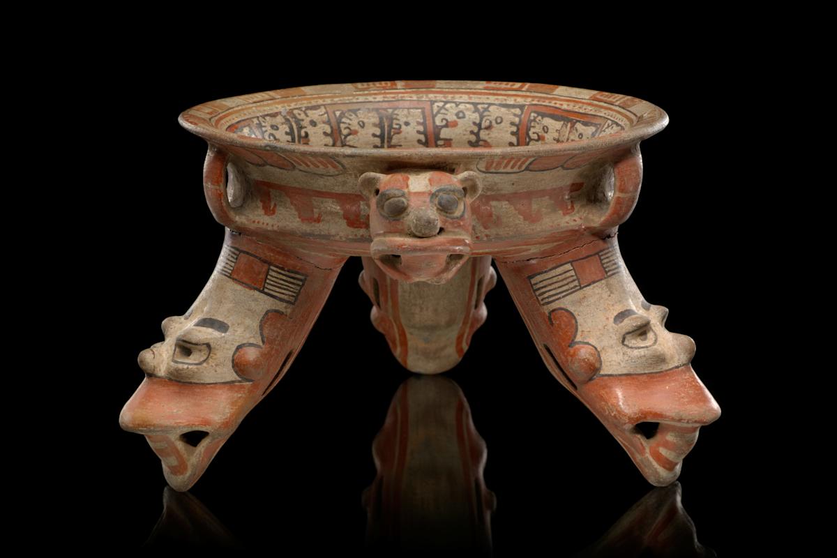 Greater Nicoya tripod bowl with human and harpy eagle design and effigy feet (AD 800&ndash;1350). Isla de Ometepe, Lake Nicaragua, Rivas Department, Nicaragua. Photo: Ernest Amoro