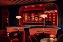 A dimly lit, elegant lounge features intimate seating with red upholstery, dark marble tables, and warm lighting from hanging lamps. The background shows a stage with a piano and glowing string lights creating a cozy ambiance.