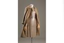 "Gold evening coat and dress in cashmere, silk jersey and sequins" (1958), by Traina-Norell. Courtesy, The
Museum at FIT, Gift of Lauren Bacall.
