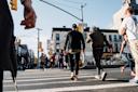 People walking across the street in Lower East Side, Manhattan