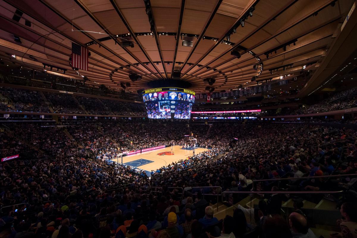 Basketball game with crowd at Madison Square Garden in Manhattan, NYC