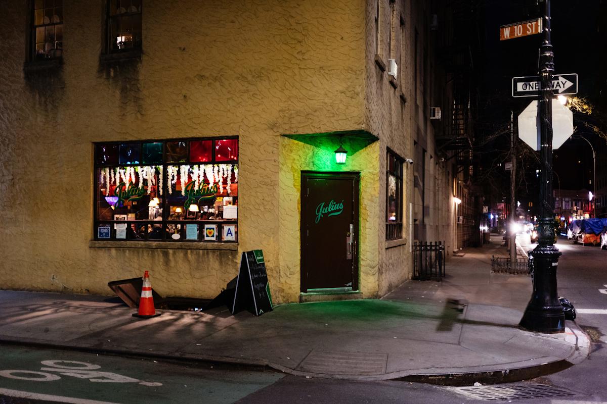 exterior of Julius, a bar in the west village, at dusk