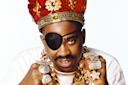 Slick Rick showing off his rings