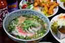 Bowl of soup and food at 5ive Spice