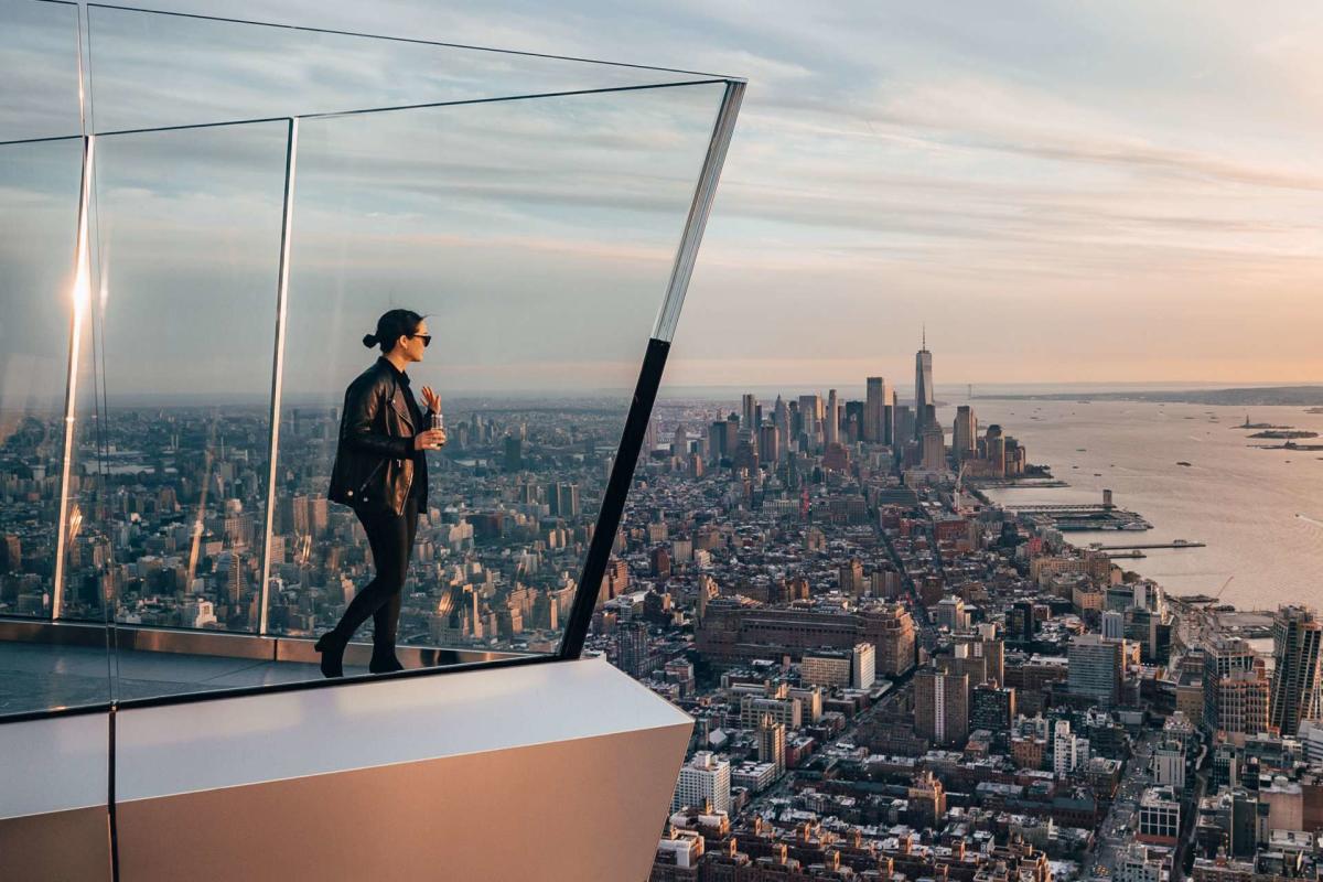 A person looks at the video from the Edge Observation Deck NYC