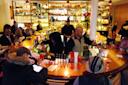 People having drinks at Red Rooster in Harlem, NYC