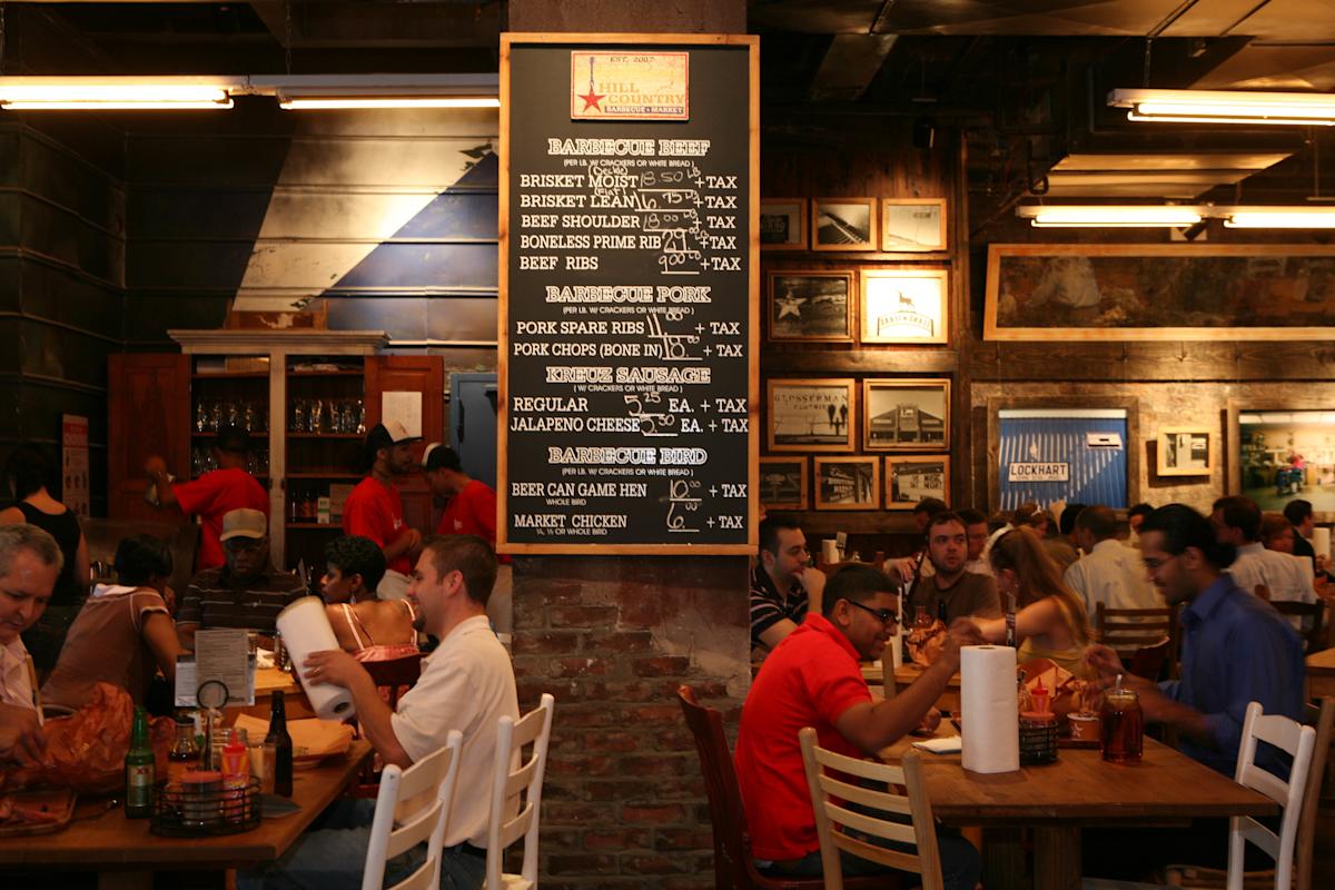 People dining in Hill Country Barbecue Market in Manhattan,NYC