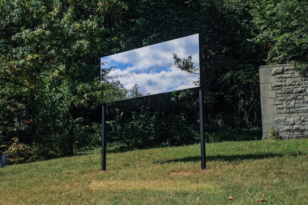 Chlo&euml; Bass, How much of life is coping?, 2019. Mirrored stainless steel with frosted vinyl lettering, 120 x 48 in. Courtesy the artist. Photo: SaVonne Anderson