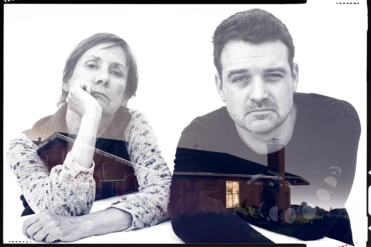 A woman and a man sit side by side, both looking at the camera with serious expressions. A semi-transparent image of a house is overlaid across the lower part of the photo. The background is plain white.
