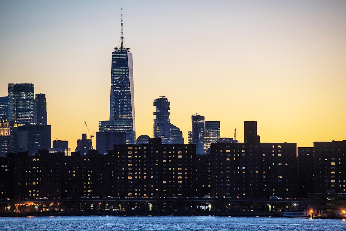 View of the New York City skyline at dusk.