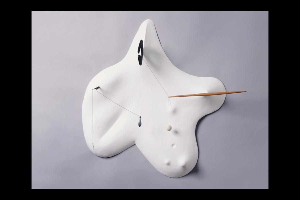 "Yellow Landscape" (1943) by Isamu Noguchi. Magnesite, wood, string, metal fishing weight. 30 1/2 x 32 5/8 x 6 3/4 inches. &copy; The Isamu Noguchi Foundation and Garden Museum, New York/ARS. Photograph by Kevin Noble.