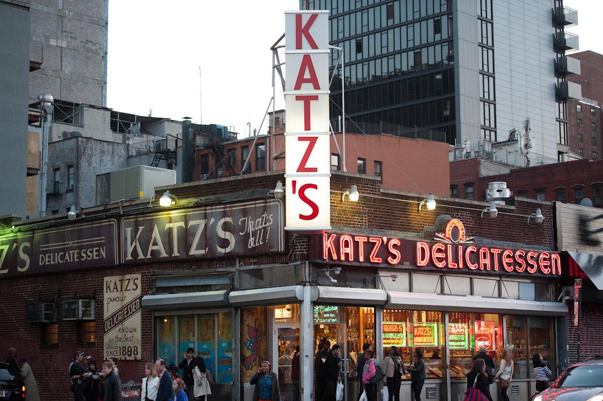 People outside of Katz Delicatessen in the Lower East Side, NYC