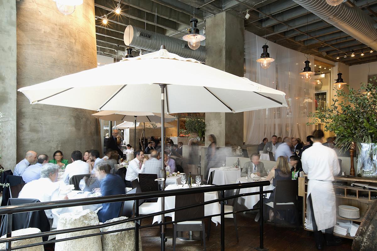 People dining at Estiatorio Milos in Manhattan, NYC