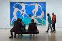 People look at art at the Museum of Modern Art